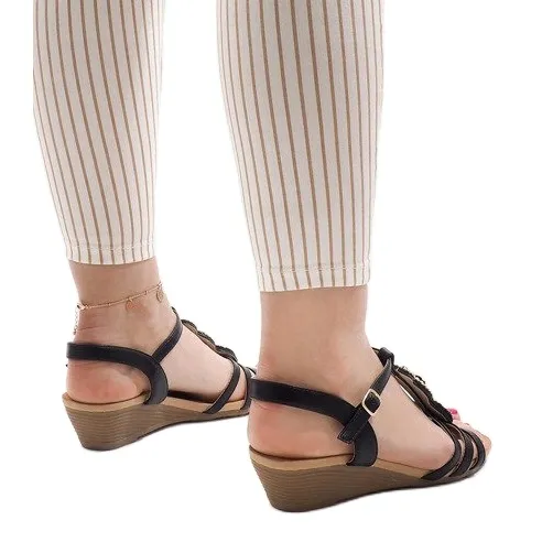 ZWARTE SLEEHAKSANDALEN MET MK10 NOPPEN